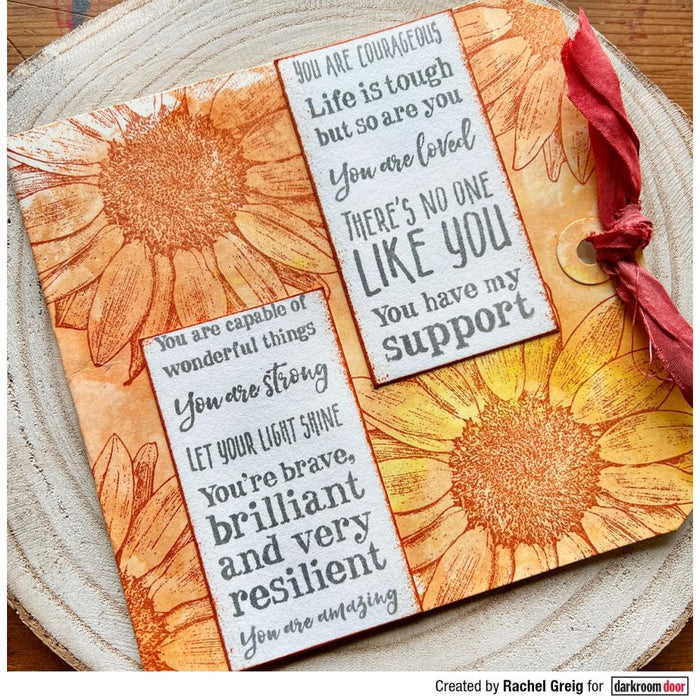 Darkroom Door - Rubber Stamp Set - Sunflowers. Darkroom Door Rubber Stamp Sets are mounted on cling foam and supplied in a DVD size storage case with a labelled spine for easy identification. Available at Embellish Away located in Bowmanville Ontario Canada. Example by Rachel Greig.