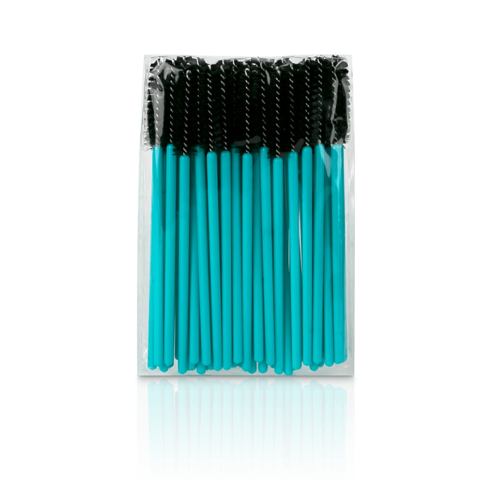 Teal eyelash mascara brush in a clear packaging case on a white background