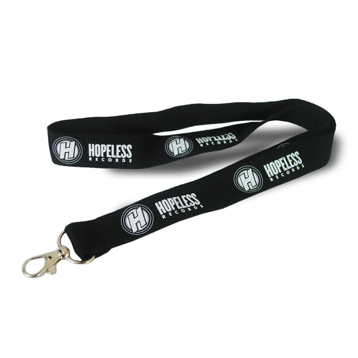 A black Hopeless Records lanyard with a silver clasp, featuring the logo and text printed in white along the fabricโideal for holding your ID badge.