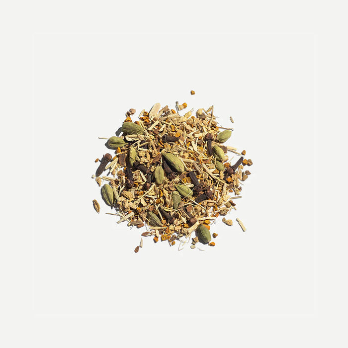 Love Tea Kapha Loose Leaf Tea leaves, Ayurvedic herbal blend with ginseng, turmeric, ginger, and cinnamon.