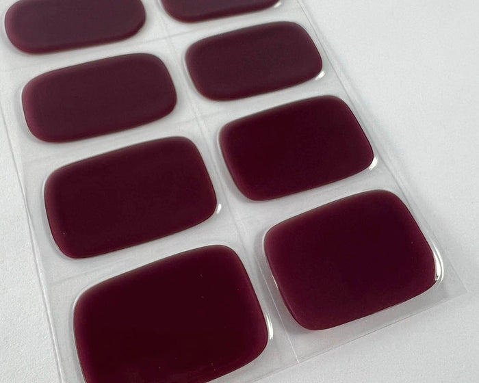 Mystic Plum gel nail wraps, angled close-up