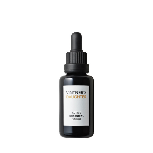 A black bottle with a dropper containing the 'Active Botanical Serum' by Vintner's Daughter, placed against a white background.