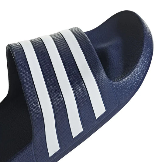 Navy blue Adidas Adilette Aqua slides with textured footbed and adjustable strap, designed for comfort and casual wear