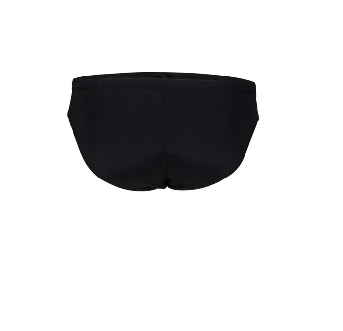 Black Arena men's team swim briefs shown on model, highlighting sleek, snug fit and durable fabric for competitive swimming.