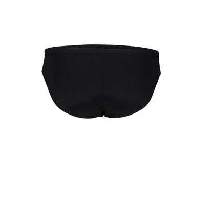 Black Arena men's team swim briefs shown on model, highlighting sleek, snug fit and durable fabric for competitive swimming.