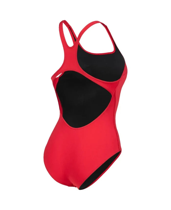 Red Arena Women's Team Swim Pro Solid Swimsuit, a sleek and fitted one-piece swimwear for women, shown on a model.