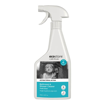 A white spray bottle labeled 'ecostore Bathroom & Shower Cleaner' with a picture of a shower screen with a child pressing their face up to it.