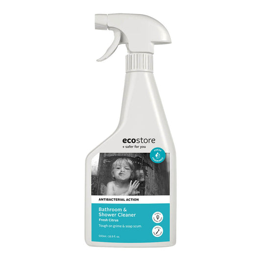 A white spray bottle labeled 'ecostore Bathroom & Shower Cleaner' with a picture of a shower screen with a child pressing their face up to it.