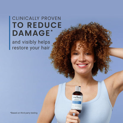 Woman holding a bottle of hair care product with text about reducing damage and restoring hair.