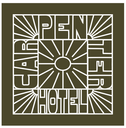 A olive green bandana with white text and graphic design resembling a sunburst pattern.