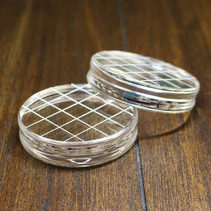 Catherine Pooler - Acrylic Grid Stamping Block - 2-3/4" Round. 2.75" clear acrylic grid. Available at Embellish Away located in Bowmanville Ontario Canada.