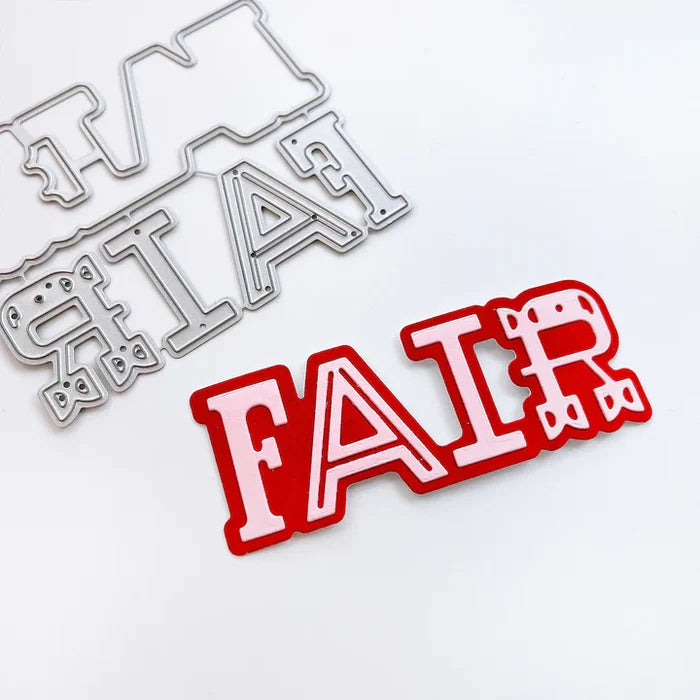 Catherine Pooler - Layered Word Dies - Fair. Perfect for adding flair to your cards and scrapbook pages- try the Fair Layered Word Die. Available at Embellish Away located in Bowmanville Ontario Canada.