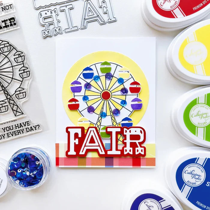 Catherine Pooler - Layered Word Dies - Fair. Perfect for adding flair to your cards and scrapbook pages- try the Fair Layered Word Die. Available at Embellish Away located in Bowmanville Ontario Canada. Example by brand ambassador.