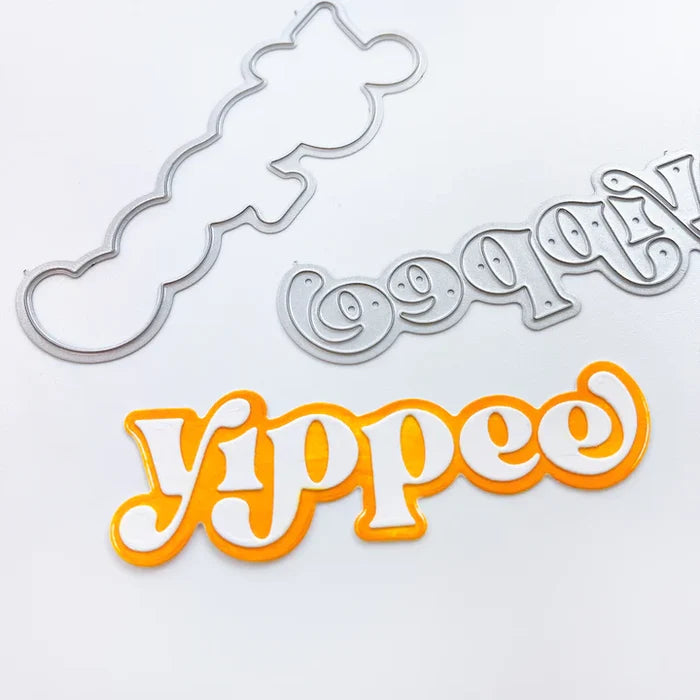 Catherine Pooler - Layered Word Dies - Yippee. Add excitement to your next creation with the Yippee Layered Word Die. This die comes with individual letters that can be used alone on or over the background layer for more color and interest. Available at Embellish Away located in Bowmanville Ontario Canada.
