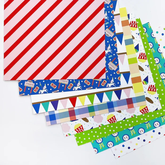 Catherine Pooler - Patterned Paper - Blue Ribbon. This pack of 6x6 paper features festive images from the fair like carousel horses and corn dogs and snow cones! Available at Embellish Away located in Bowmanville Ontario Canada.