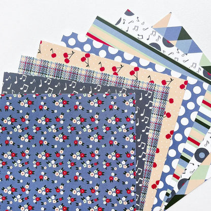 Catherine Pooler - Patterned Paper - Bobby Soxer. The Bobby Soxer Patterned Paper is inspired by life and music of the 1940's. Tweed, tiny flowers and argyle socks- this paper pack has fabric and textile inspired patterns and music inspired prints! Available at Embellish Away located in Bowmanville Ontario Canada.