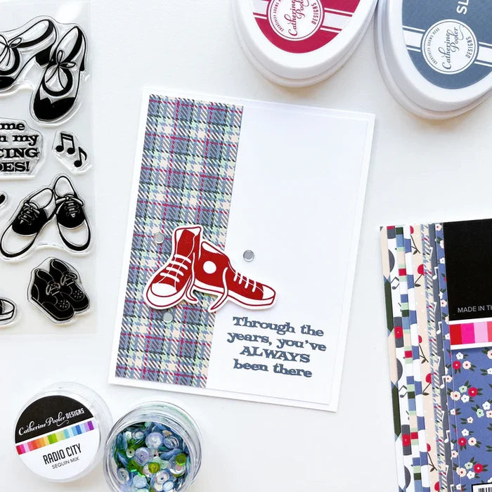 Catherine Pooler - Patterned Paper - Bobby Soxer. The Bobby Soxer Patterned Paper is inspired by life and music of the 1940's. Tweed, tiny flowers and argyle socks- this paper pack has fabric and textile inspired patterns and music inspired prints! Available at Embellish Away located in Bowmanville Ontario Canada. card by brand ambassador.