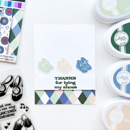 Catherine Pooler - Patterned Paper - Bobby Soxer. The Bobby Soxer Patterned Paper is inspired by life and music of the 1940's. Tweed, tiny flowers and argyle socks- this paper pack has fabric and textile inspired patterns and music inspired prints! Available at Embellish Away located in Bowmanville Ontario Canada. card by brand ambassador.
