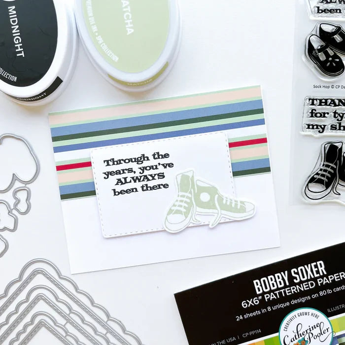 Catherine Pooler - Patterned Paper - Bobby Soxer. The Bobby Soxer Patterned Paper is inspired by life and music of the 1940's. Tweed, tiny flowers and argyle socks- this paper pack has fabric and textile inspired patterns and music inspired prints! Available at Embellish Away located in Bowmanville Ontario Canada. card by brand ambassador.