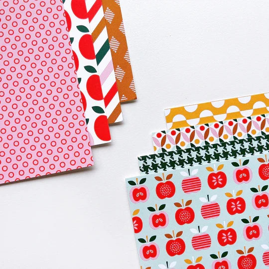 Catherine Pooler - Patterned Paper - Bushel and a Peck. I love this paper....a bushel and a peck! The Bushel and a Peck Patterned Paper features a fun and modern mix of apple prints and fun patterns. Available at Embellish Away located in Bowmanville Ontario Canada.