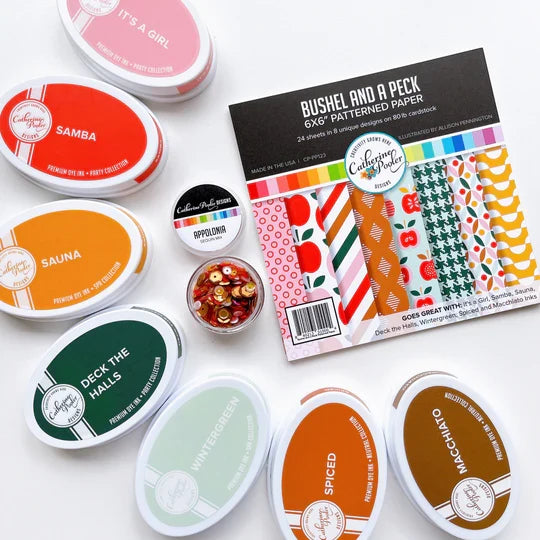 Catherine Pooler - Patterned Paper - Bushel and a Peck. I love this paper....a bushel and a peck! The Bushel and a Peck Patterned Paper features a fun and modern mix of apple prints and fun patterns. Available at Embellish Away located in Bowmanville Ontario Canada.