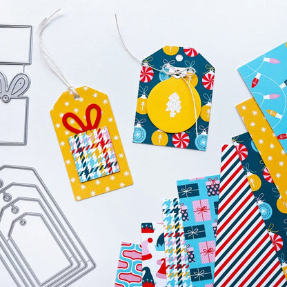 Catherine Pooler - Patterned Paper - Holiday De-Lights. When trimming the tree, don't forget the holiday de-lights! The Holiday De-Lights Patterned Paper is a quintessential holiday mix of patterns and prints! Available at Embellish Away located in Bowmanville Ontario Canada. Example by brand ambassador.