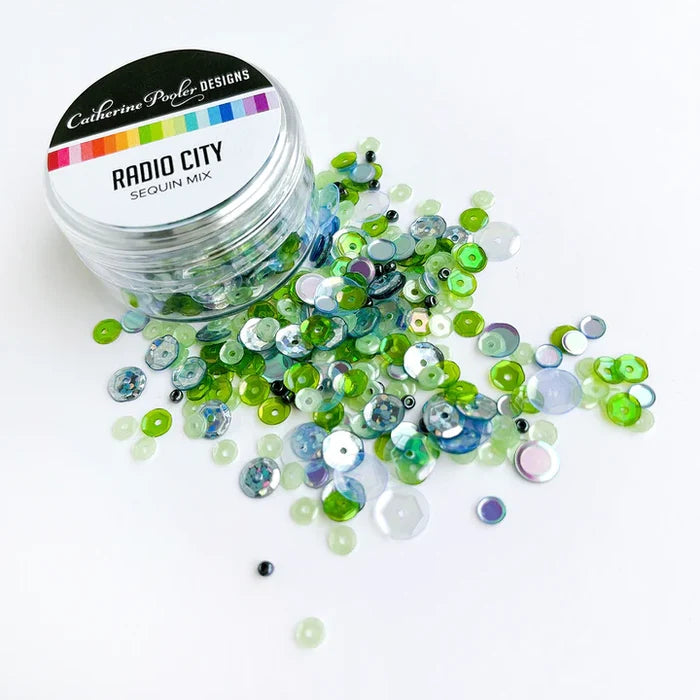Catherine Pooler - Sequin Mix - Radio City. Approximately 1 Tablespoon mixture packaged in a clear screw top round container. Available at Embellish Away located in Bowmanville Ontario Canada.