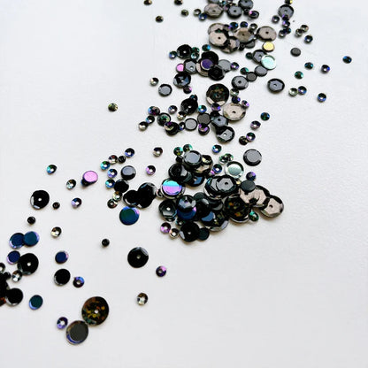 Catherine Pooler - Sequin Mix - Salem Sequin. When you need a class black sequin mix, grab this Salem Mix. Named for the Massachusetts town known for its eerie past, this mix brings the holographic sparkle and iridescent shine. Available at Embellish Away located in Bowmanville Ontario Canada.