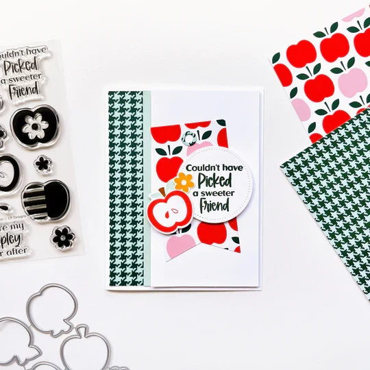 Catherine Pooler - Stamp & Die Set - Appley Ever After. An apple a day brings card making hoorays! The Appley Ever After Stamp & Die Set couldn't be any sweeter! This set features mod patterned apple stamps with all the extras! Available at Embellish Away located in Bowmanville Ontario Canada. Example by brand ambassador.