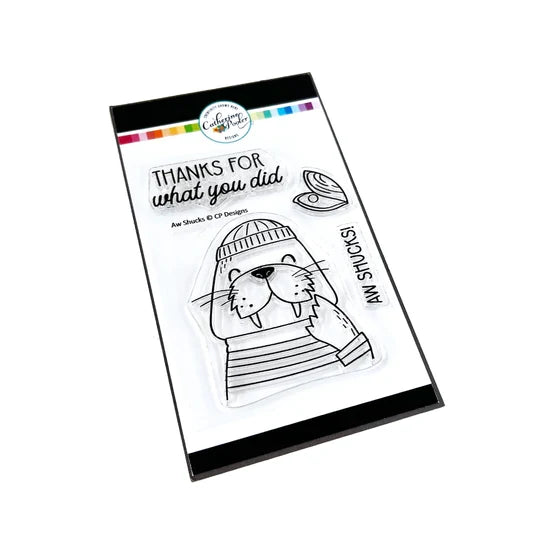 Catherine Pooler - Stamp & Die Set - Aw Shucks. Meet the cutest fisherman on the seas! The Aw Shucks Stamp & Die Set features a line art walrus that coordinates with the Ahoy Matey Stamp Set. Available at Embellish Away located in Bowmanville Ontario Canada.