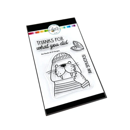 Catherine Pooler - Stamp & Die Set - Aw Shucks. Meet the cutest fisherman on the seas! The Aw Shucks Stamp & Die Set features a line art walrus that coordinates with the Ahoy Matey Stamp Set. Available at Embellish Away located in Bowmanville Ontario Canada.