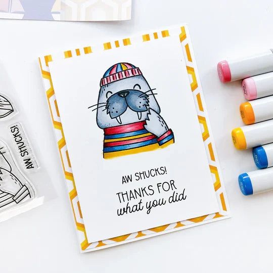 Catherine Pooler - Stamp & Die Set - Aw Shucks. Meet the cutest fisherman on the seas! The Aw Shucks Stamp & Die Set features a line art walrus that coordinates with the Ahoy Matey Stamp Set. Available at Embellish Away located in Bowmanville Ontario Canada. Example by brand ambassador.