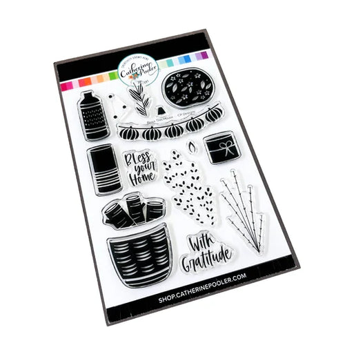 Catherine Pooler - Stamp & Die Set - Bless This House. Create a card inspired by the latest fall themed home decor trends with this Set. This set features warm and cozy fireside decor images like candles, a vase and basket of wood. Available at Embellish Away located in Bowmanville Ontario Canada.
