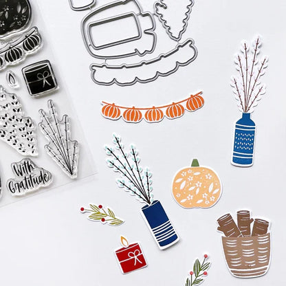 Catherine Pooler - Stamp & Die Set - Bless This House. Create a card inspired by the latest fall themed home decor trends with this Set. This set features warm and cozy fireside decor images like candles, a vase and basket of wood. Available at Embellish Away located in Bowmanville Ontario Canada. Example by brand ambassador.