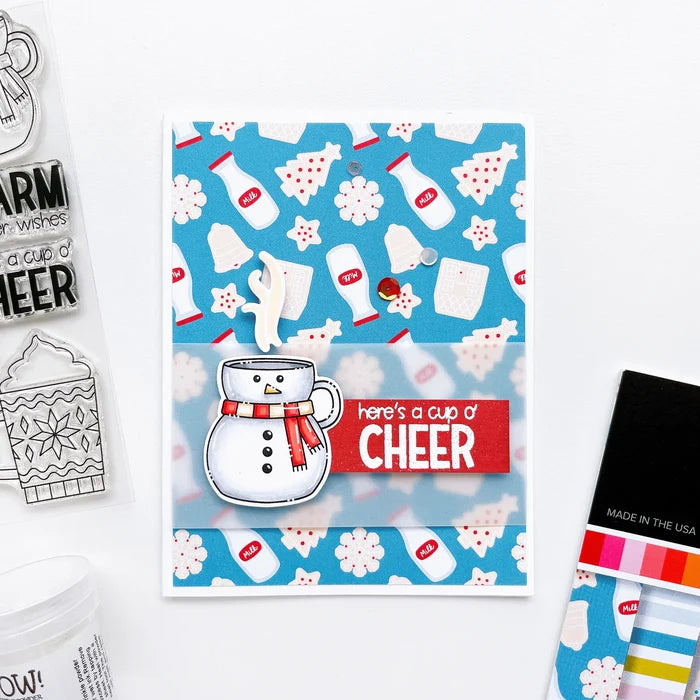 Catherine Pooler - Stamp & Die Set - Holiday Mug. From the makers of the original Mug Shots Stamp Set comes Holiday Mug Shots Stamps and coordinating dies! Features all your favorite winter friends- Santa, Rudolf, Snowman and even the Gingerbread man. Available at Embellish Away located in Bowmanville Ontario Canada. Example by brand ambassador.