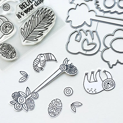 Catherine Pooler - Stamp & Die Set - Jungle Amigos. Send a jungle greeting to your friend and let them know "things are about to get wild"! The Jungle Amigos Set features a happy sloth and his toucan friend who are ready to hang out on your next card. Available at Embellish Away located in Bowmanville Ontario Canada.