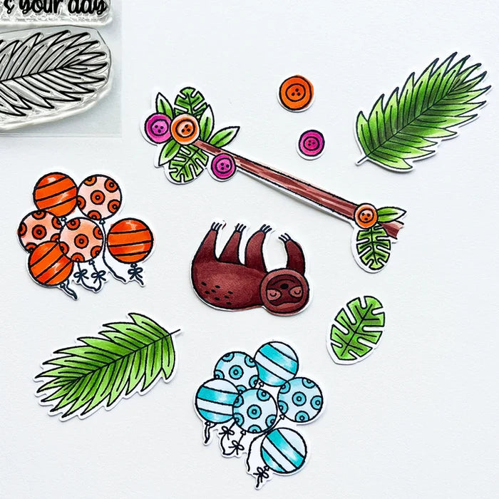Catherine Pooler - Stamp & Die Set - Jungle Amigos. Send a jungle greeting to your friend and let them know "things are about to get wild"! The Jungle Amigos Set features a happy sloth and his toucan friend who are ready to hang out on your next card. Available at Embellish Away located in Bowmanville Ontario Canada.