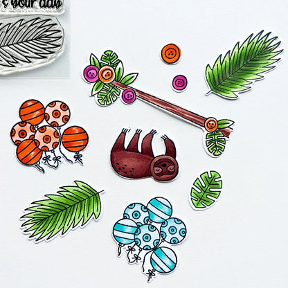 Catherine Pooler - Stamp & Die Set - Jungle Amigos. Send a jungle greeting to your friend and let them know "things are about to get wild"! The Jungle Amigos Set features a happy sloth and his toucan friend who are ready to hang out on your next card. Available at Embellish Away located in Bowmanville Ontario Canada.