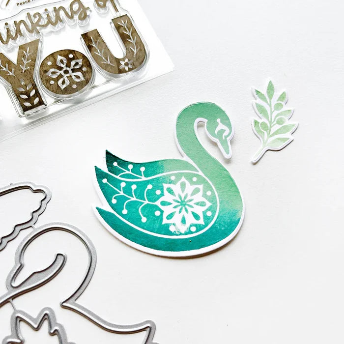 Catherine Pooler - Stamp & Die Set - Peace In Flight. The Peace in Flight Stamp Set features ornately decorated dove and swan stamps to grace your cards. Available at Embellish Away located in Bowmanville Ontario Canada.