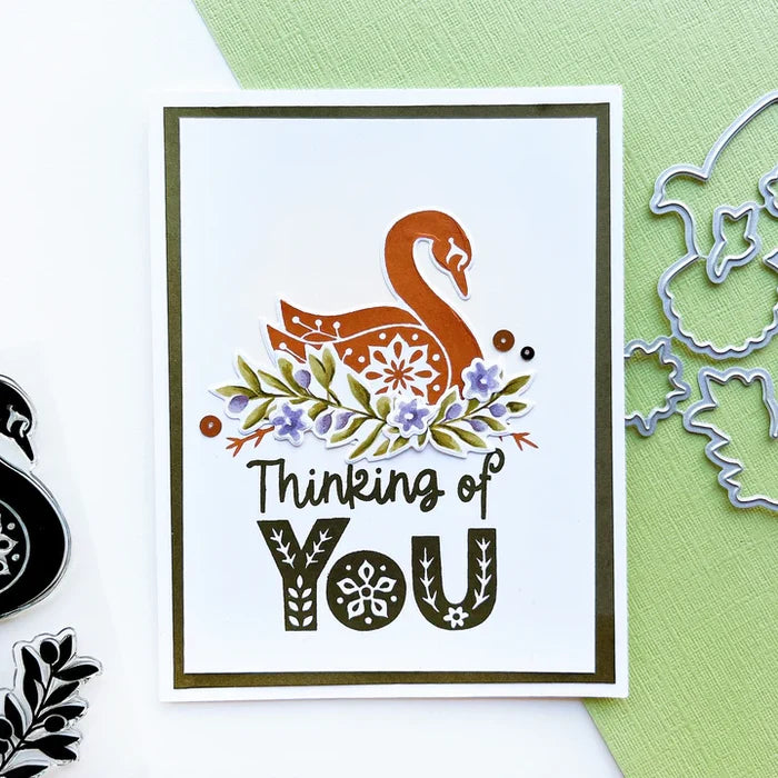Catherine Pooler - Stamp & Die Set - Peace In Flight. The Peace in Flight Stamp Set features ornately decorated dove and swan stamps to grace your cards. Available at Embellish Away located in Bowmanville Ontario Canada. card example by brand ambassador.