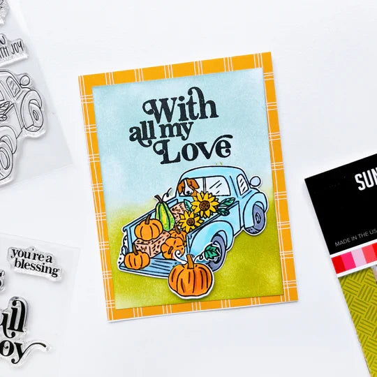 Catherine Pooler - Stamp & Die Set - Pumpkin Pick-Up. Straight from the farm, this Set is the quintessential fall image! Color in this large line art image of a vintage truck filled to the brim with hay, sunflowers and of course- the pumpkins! Available at Embellish Away located in Bowmanville Ontario Canada. Example by brand ambassador.