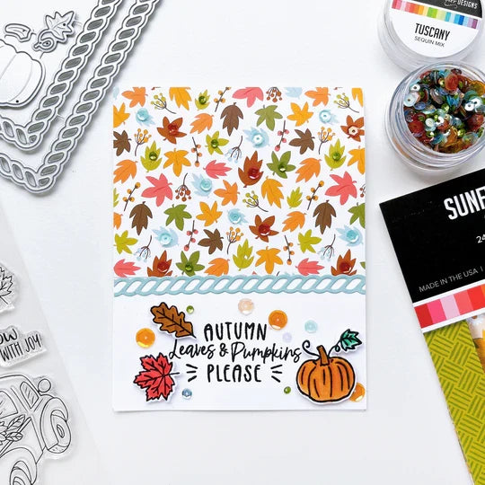Catherine Pooler - Stamp & Die Set - Pumpkin Pick-Up. Straight from the farm, this Set is the quintessential fall image! Color in this large line art image of a vintage truck filled to the brim with hay, sunflowers and of course- the pumpkins! Available at Embellish Away located in Bowmanville Ontario Canada. Example by brand ambassador.