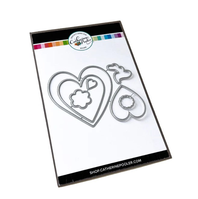 Catherine Pooler - Stamp & Die Set - Yours Truly. Send all your love with the Yours Truly Stamp & Die Set. This set of line-art heart stamps are adorned with floral and paisley patterns. Use one or layer more than one die cut heart on your card. Available at Embellish Away located in Bowmanville Ontario Canada.
