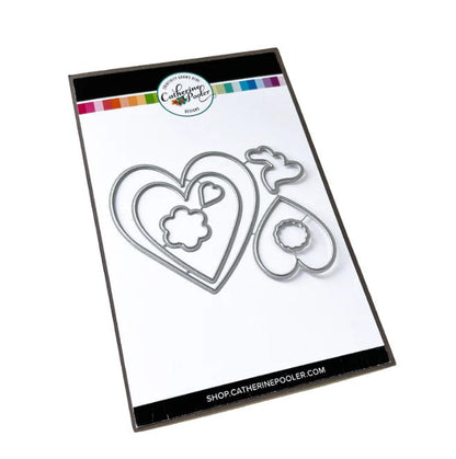 Catherine Pooler - Stamp & Die Set - Yours Truly. Send all your love with the Yours Truly Stamp & Die Set. This set of line-art heart stamps are adorned with floral and paisley patterns. Use one or layer more than one die cut heart on your card. Available at Embellish Away located in Bowmanville Ontario Canada.