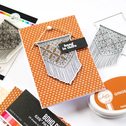 Catherine Pooler - Stamp & Dies Set - Hang in There. When you need to send a little encouragement, do it with the Hang in There Stamp Set. This 3x4 stamp set features a macrame wall hanging stamp and a tiny "hang in there" sentiment. Available at Embellish Away located in Bowmanville Ontario Canada. Card example by brand ambassador.