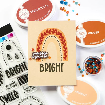 Catherine Pooler - Stamp & Dies Set - Smile Bright. Smile Bright! This 6x8 Stamp Set and coordinating dies are ready for you to piece it together to your hearts content to create a modern, boho rainbow. Available at Embellish Away located in Bowmanville Ontario Canada. Card example by brand ambassador.