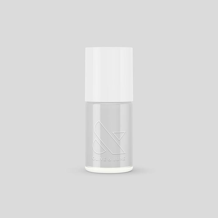 Olive and June Cloudy Skies long-lasting polish bottle with soft misty grey shade for manicures and pedicures