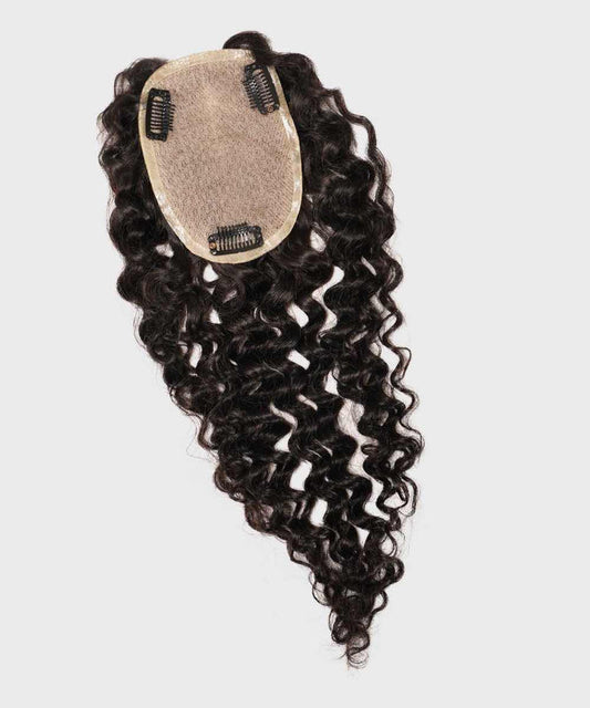 A dark brown, curly hair topper with a mesh base and four black attachment clips, perfect for volume and coverage on white background.