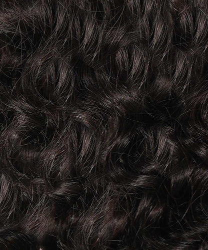 Close-up of dark brown, curly hair with defined, shiny ringlets and a voluminous, textured appearance.