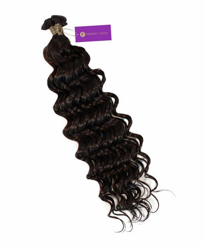 A bundle of Perfect Locks Curly Hybrid Weft Hair Extensions in Chocolate Brown, with loose curls and a purple signature tag.#color_natural-black-(1B)